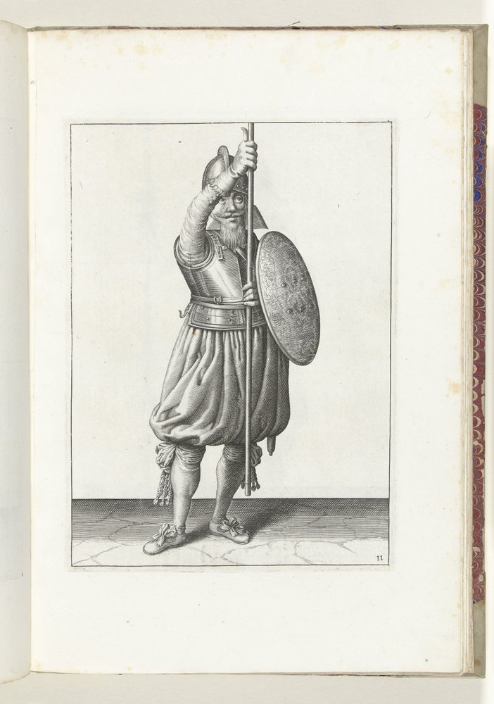 Exercise with shield and pike: the soldier returns the pike to the rest ...