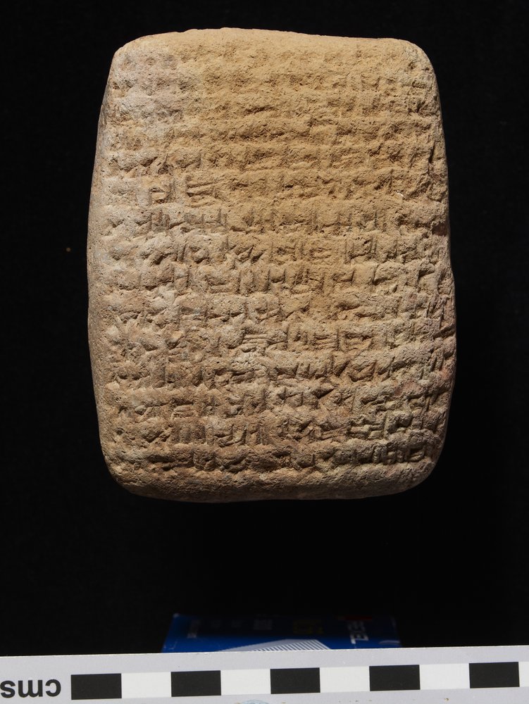 Clay tablet with cuneiform script on both sides by Babylonian