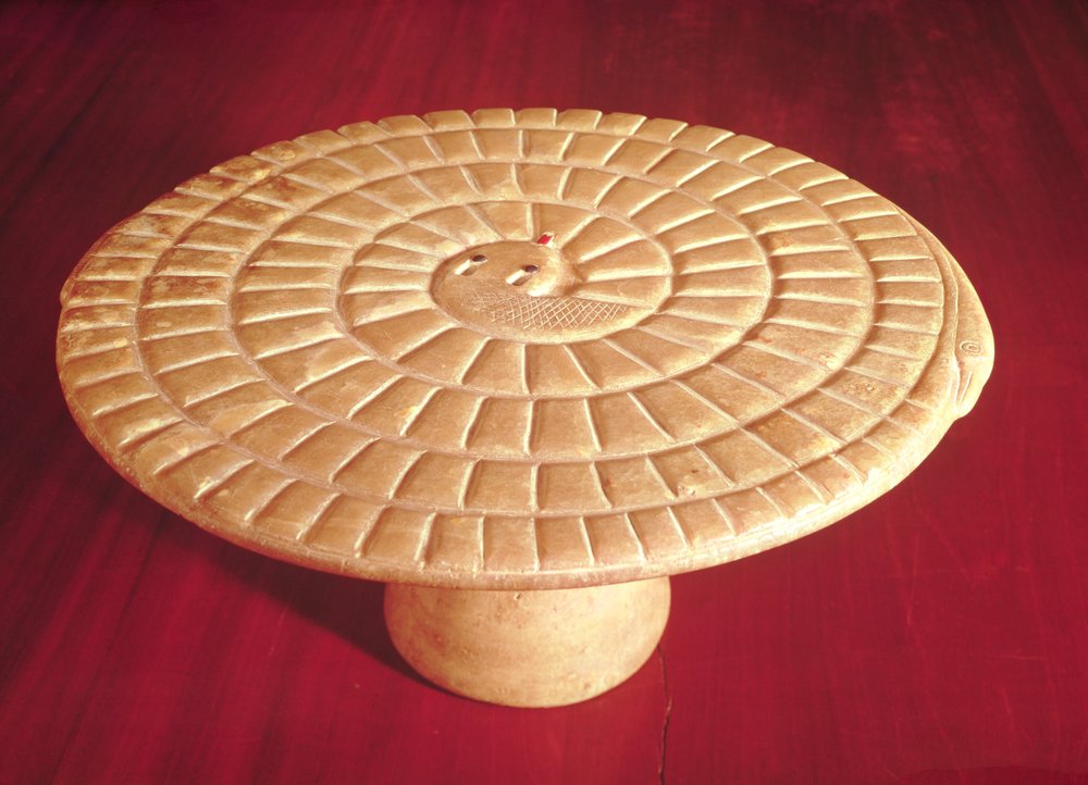 Snake shaped gaming board used for the game mehen, Thinite Period