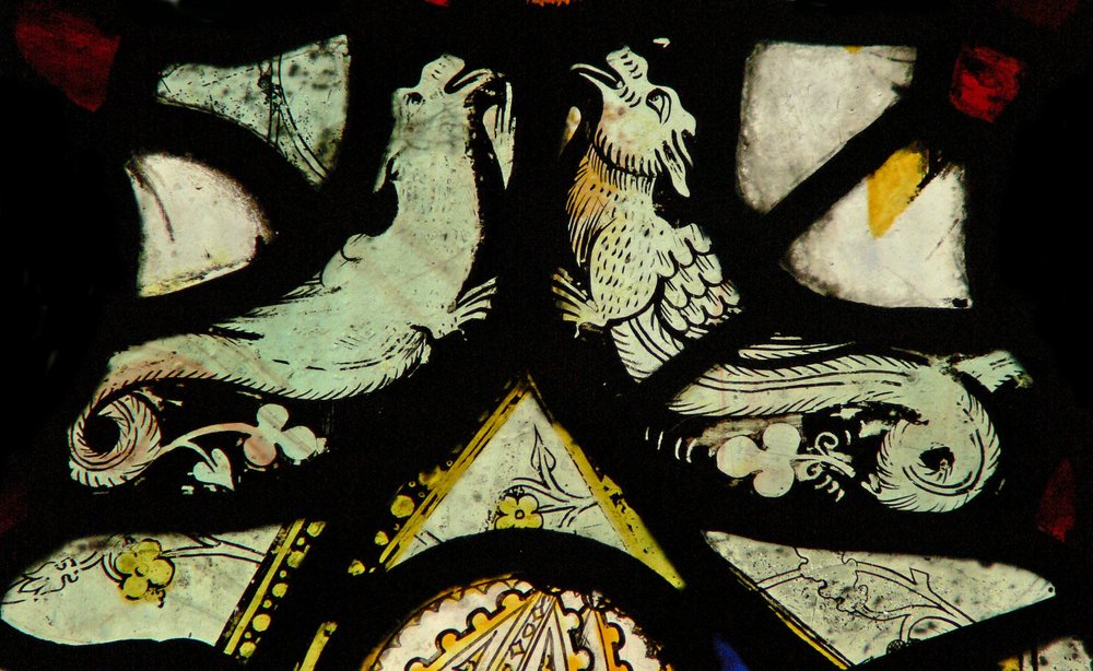 Window depicting grotesques by English School