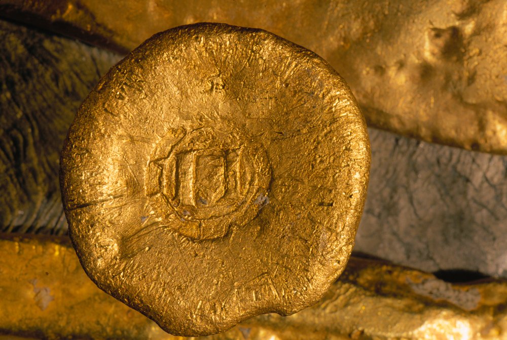 A glittering fortune in gold and silver has been recovered from the seafloor. Treasures like this gold button were shipped from the New World to Seville by way of Cuba. Courtesy of Office of the Historian of the City of Havana. by Ira Block