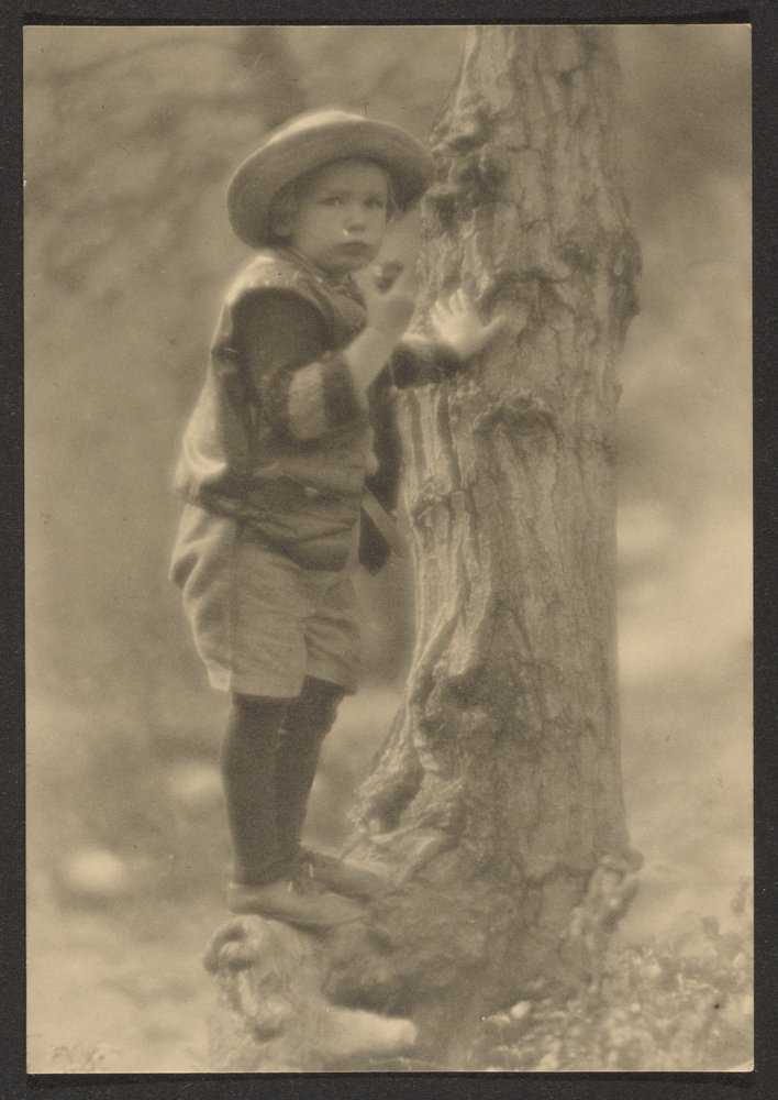 [Child Standing on Tree Root] by Louis Fleckenstein