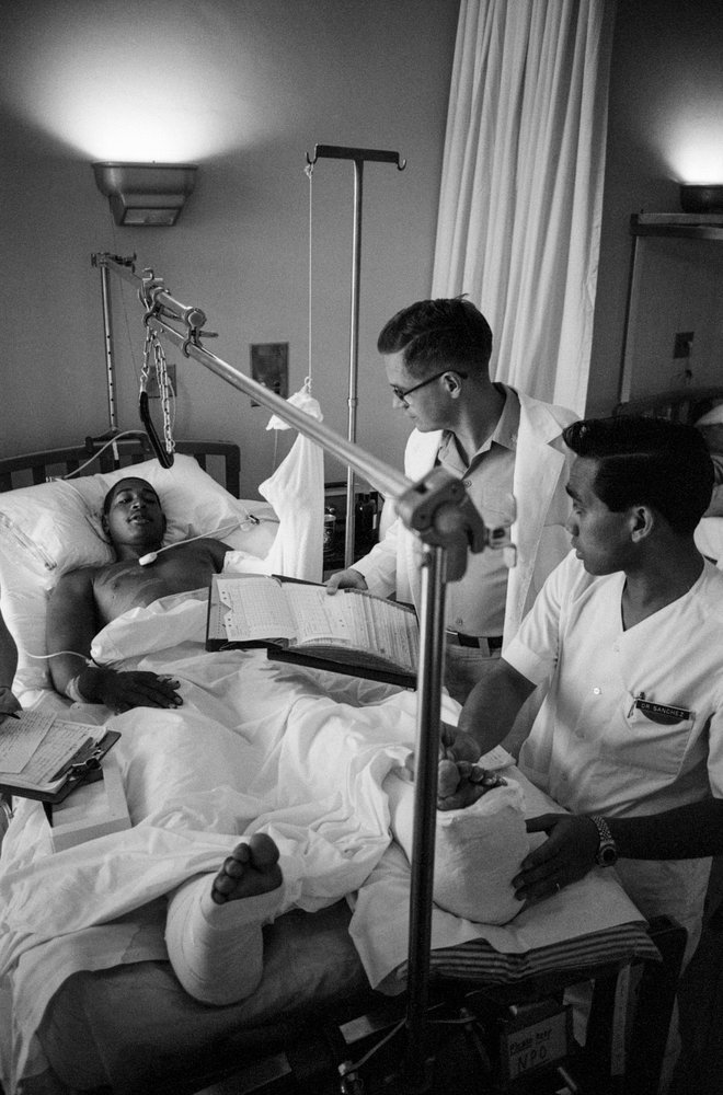 American soldiers wounded in the Vietnam War are airlifted to a hospital at Clark A... by Ted Spiegel