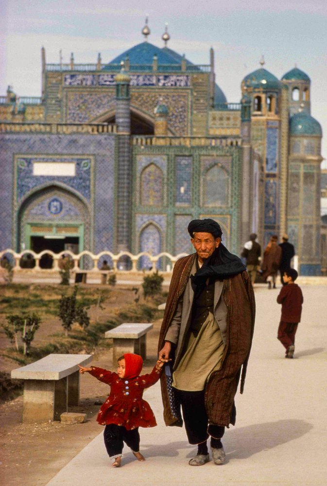 Visitors to mosque and mausoleum at Mazar-i-Sharif, Masjid-e-Kabud aka Rawze-e-Sharif by Thomas J. Abercrombie