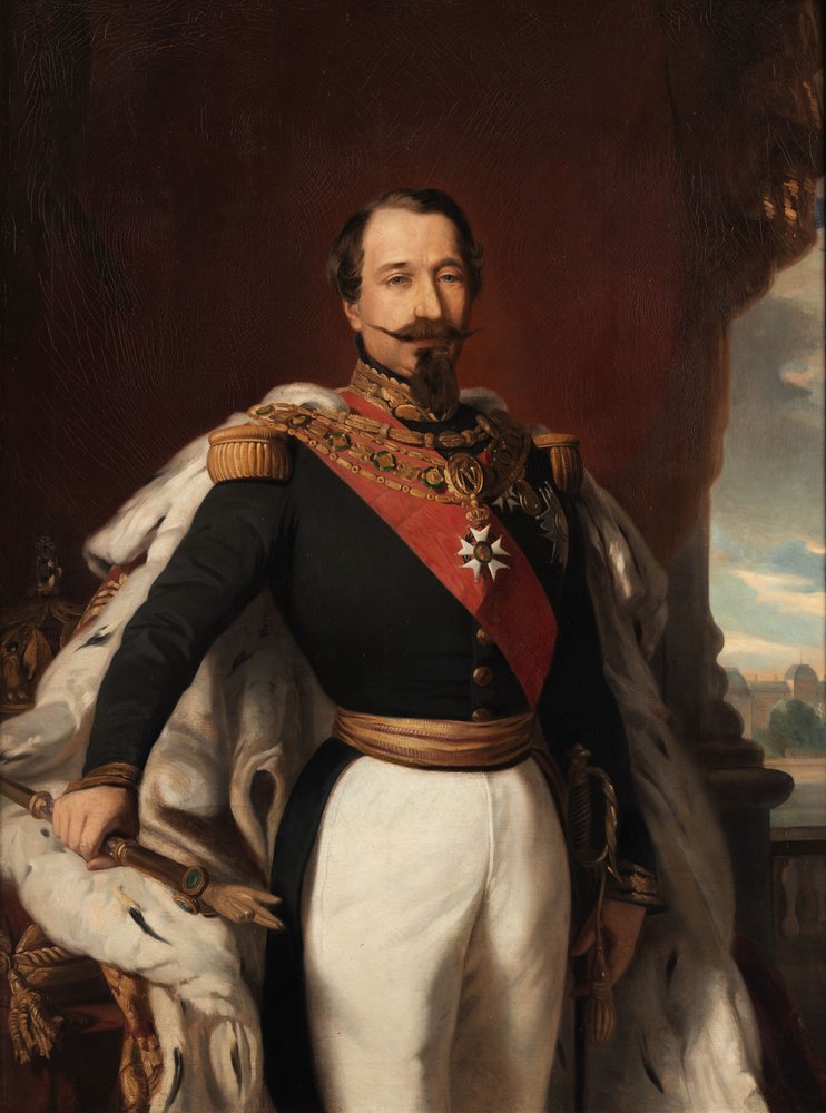 Napoleon III in uniform with an ermine cloak at a table with crown and sceptre, with the Louvre in the background by workshop of Franz Xaver Winterhalter