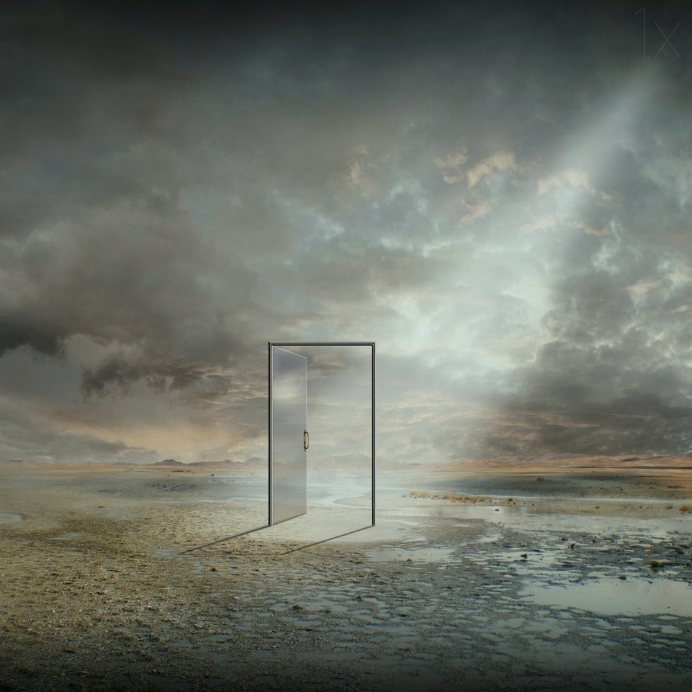 Open Door Under Stormy Sky by Franziskus Pfleghart
