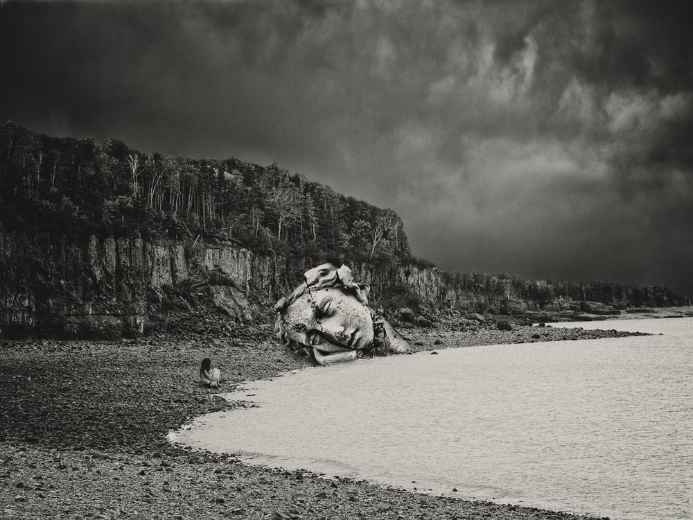 Fallen Stone Head by Jeffrey Hummel