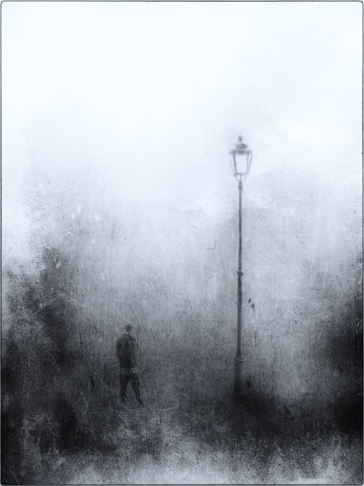 Lonely Figure Under Lamp by Jeffrey Hummel