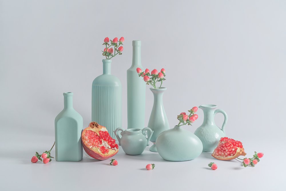 Blue Vases Pomegranate Display by Lydia Jacobs