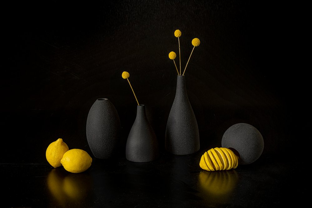 Yellow Lemons Black Vases by Lydia Jacobs