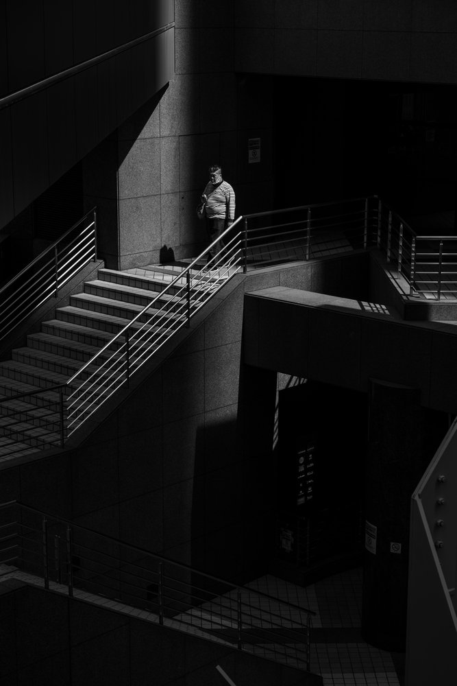 Solitary Man on Stairs by Takumi Hiura
