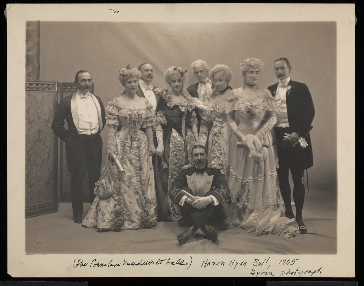 Portrait of five men and four women at the James Hazen Hyde Ball, New York, January 31 by Byron Company