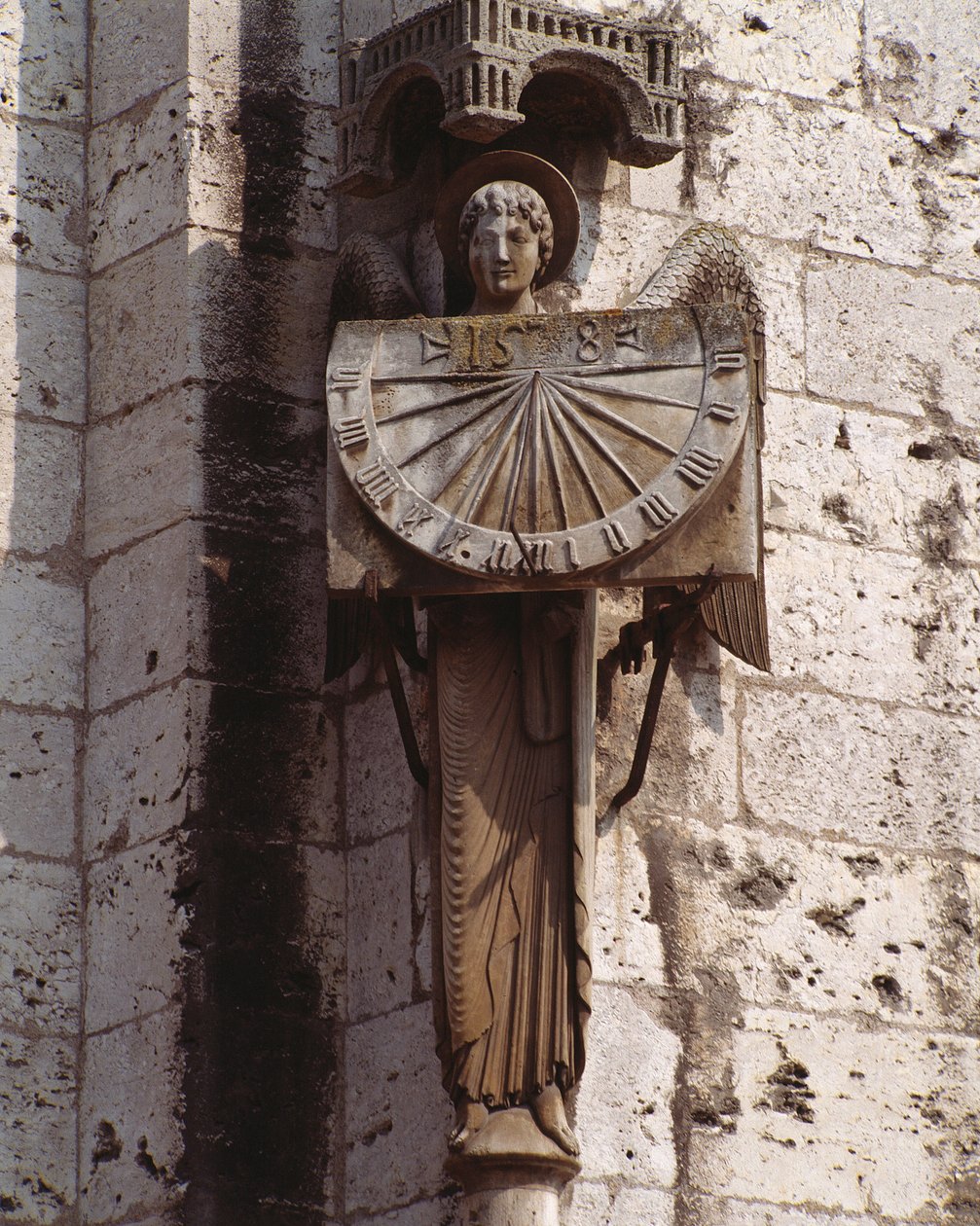 Gothic Art: Representation of the Angel on the Dial, Sculpture of the 20th century after an original of the 16th century preserved in the crypt, south-west corner of the Basilica Notre Dame de Chartres by (after) French School