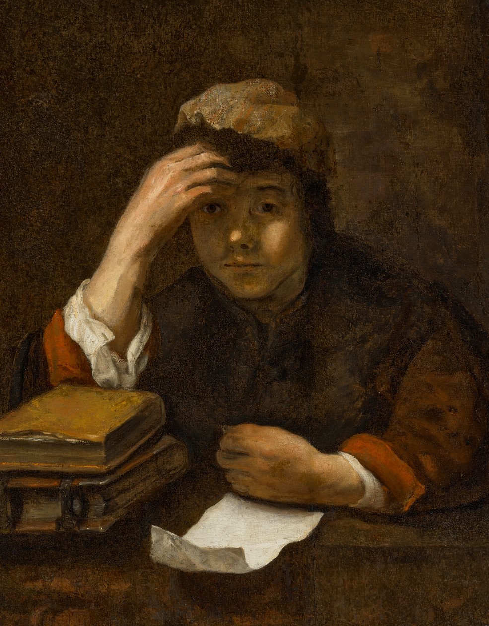 A Boy Reading by (studio of) Rembrandt Harmensz. van Rijn