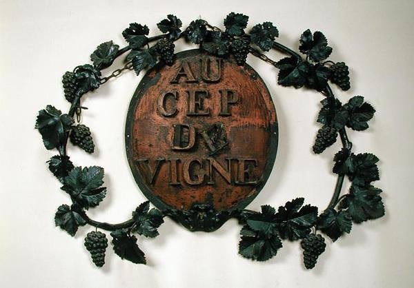 Au Cep du Vigne, wine merchants sign by French School
