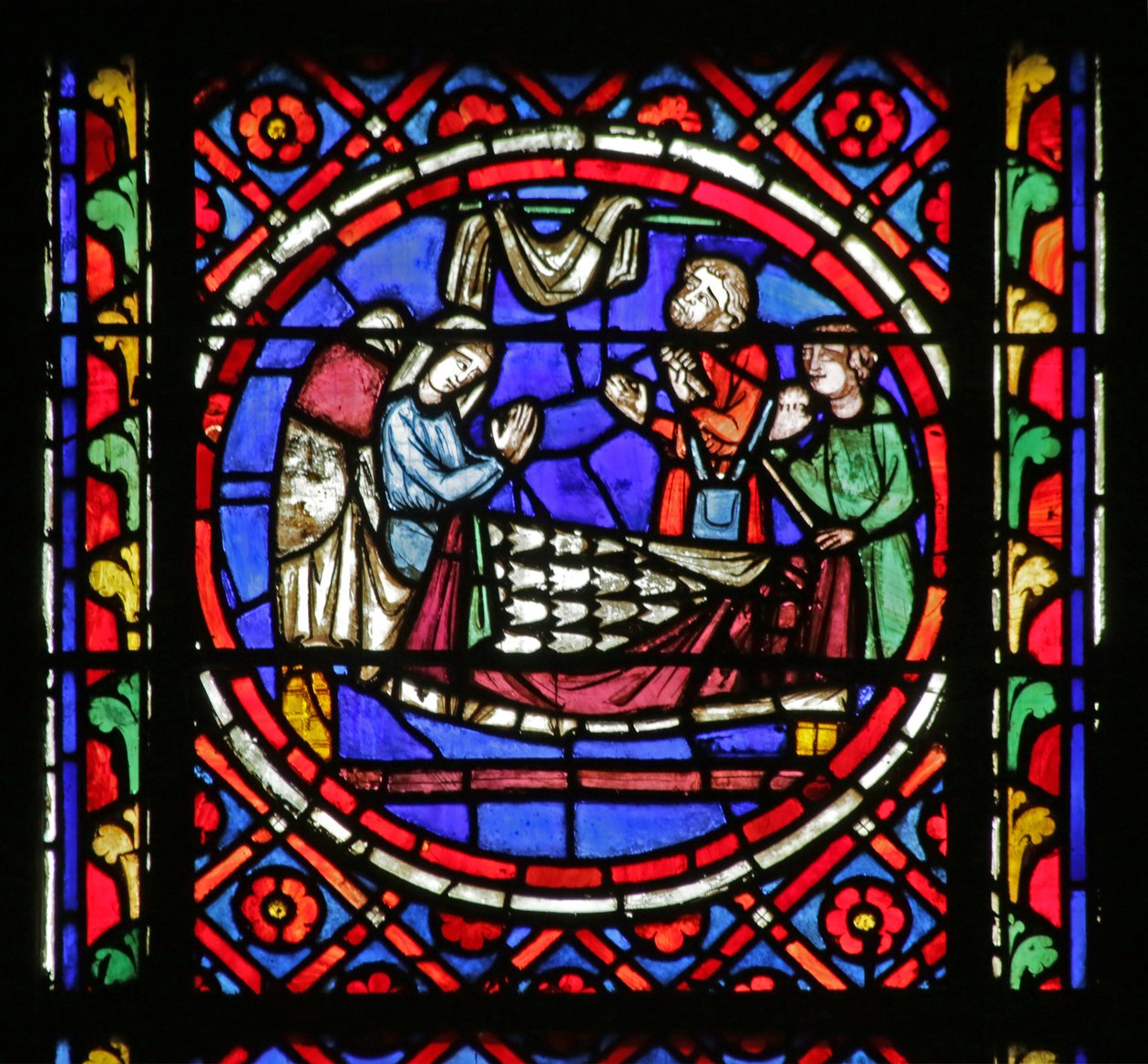 Window depicting the Blind Bedridden Blanda hearing the Travellers