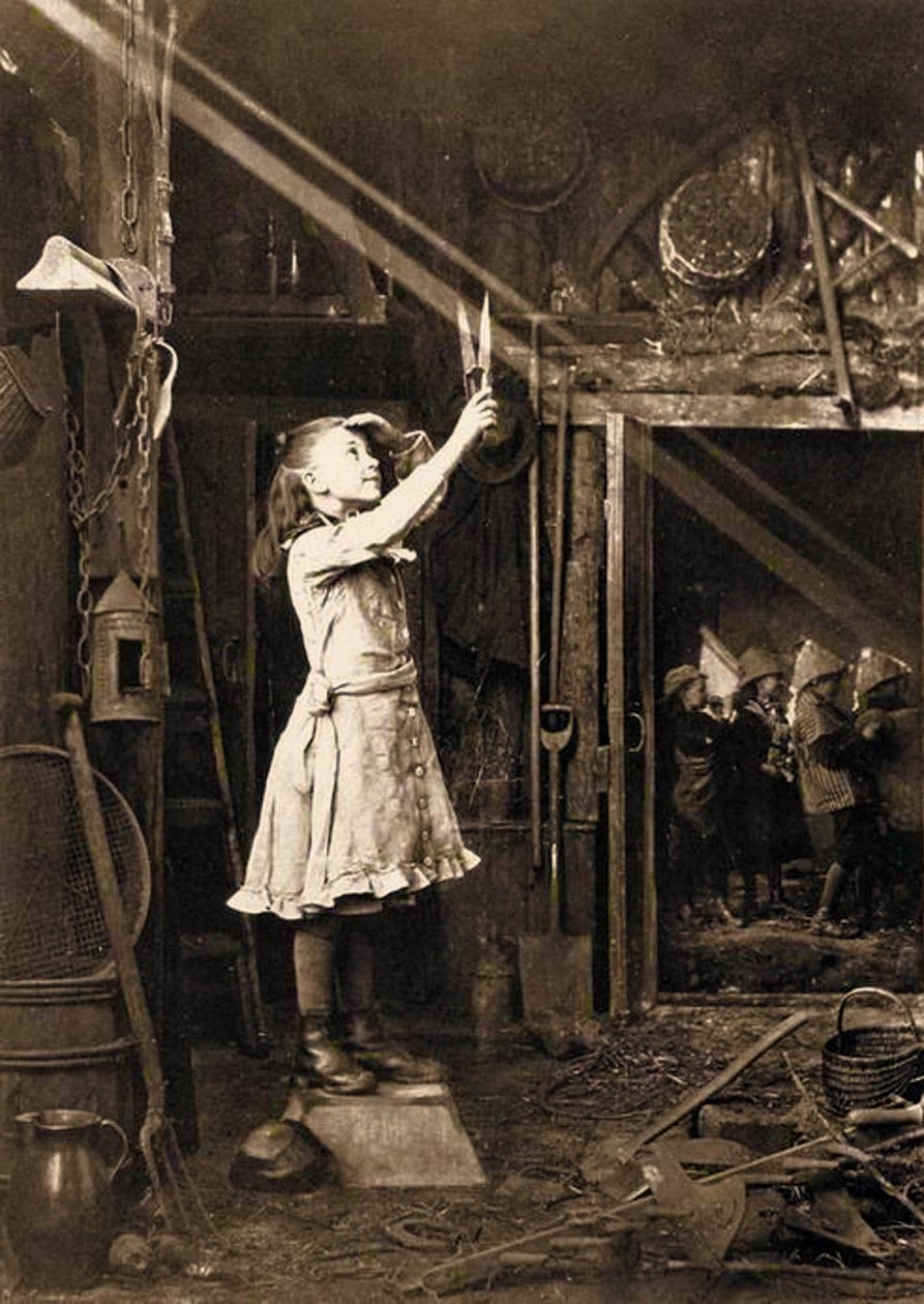 Girl cutting a Sunbeam by Adam Diston