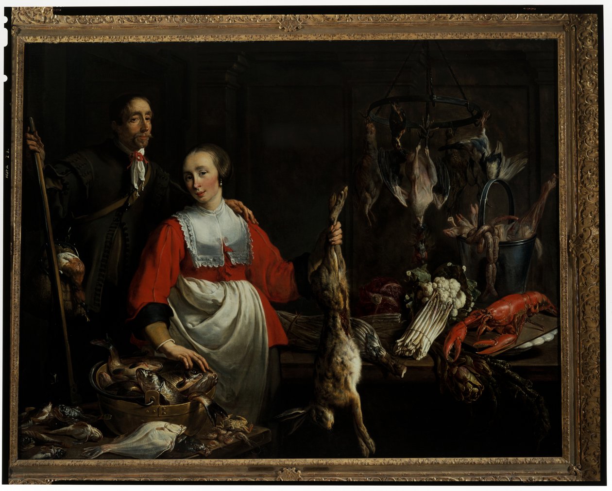A Gamekeeper with a Punt Gun and a Maidservant Holding Up a Dead Hare in a Larder by Adriaen van Utrecht