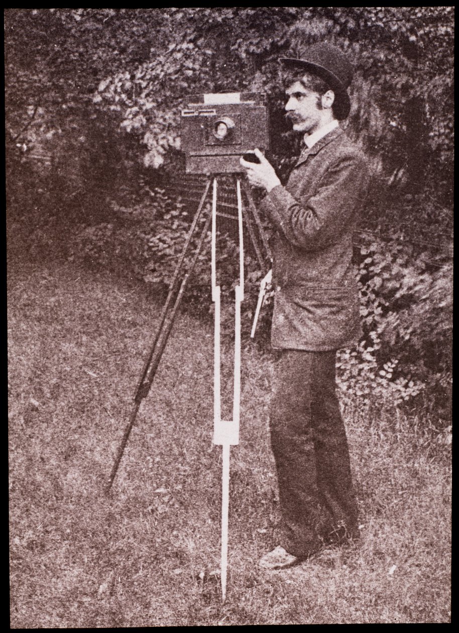 Self portrait with camera, tripod and pistol by Alfred Stieglitz