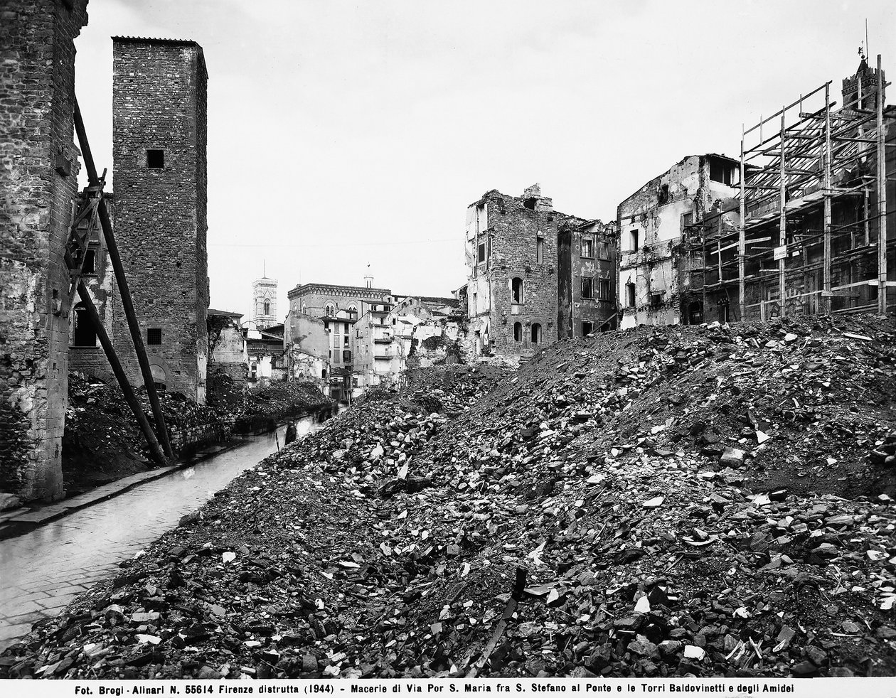 World War II: View of the rubble on Via Por Santa Maria between Santo Stefano al Ponte and the Towers of the Baldovinetti and Amidei in Florence, after the bombing. This photograph was formerly part of the Brogi Collection, but now belongs to the Alinari C by Fratelli Alinari