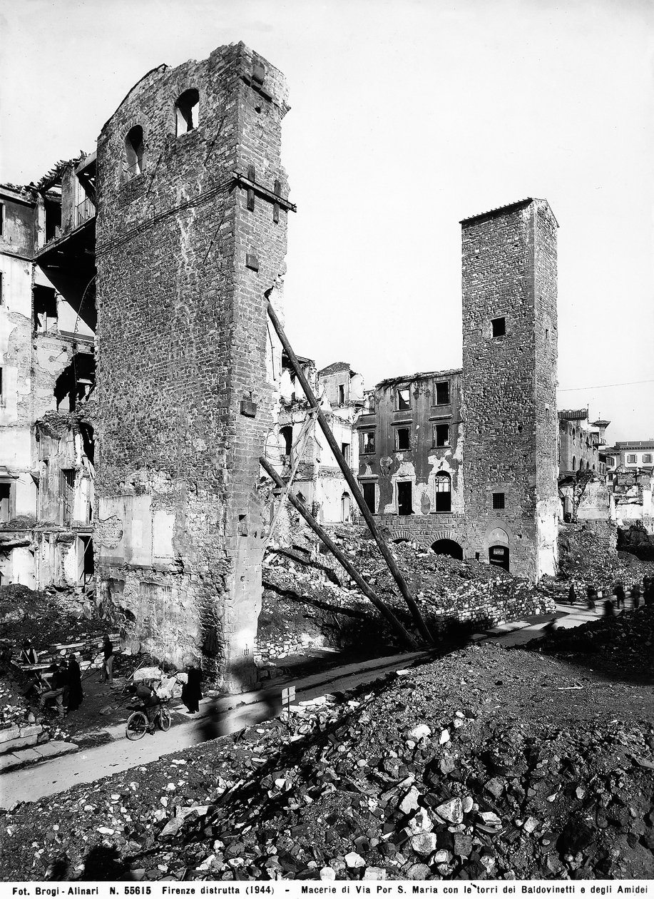 World War II: the rubble on Via Por Santa Maria with the Towers of the Baldovinetti and Amidei in Florence, after the bombing. This photograph was formerly part of the Brogi Collection, but now belongs to the Alinari Collection by Fratelli Alinari