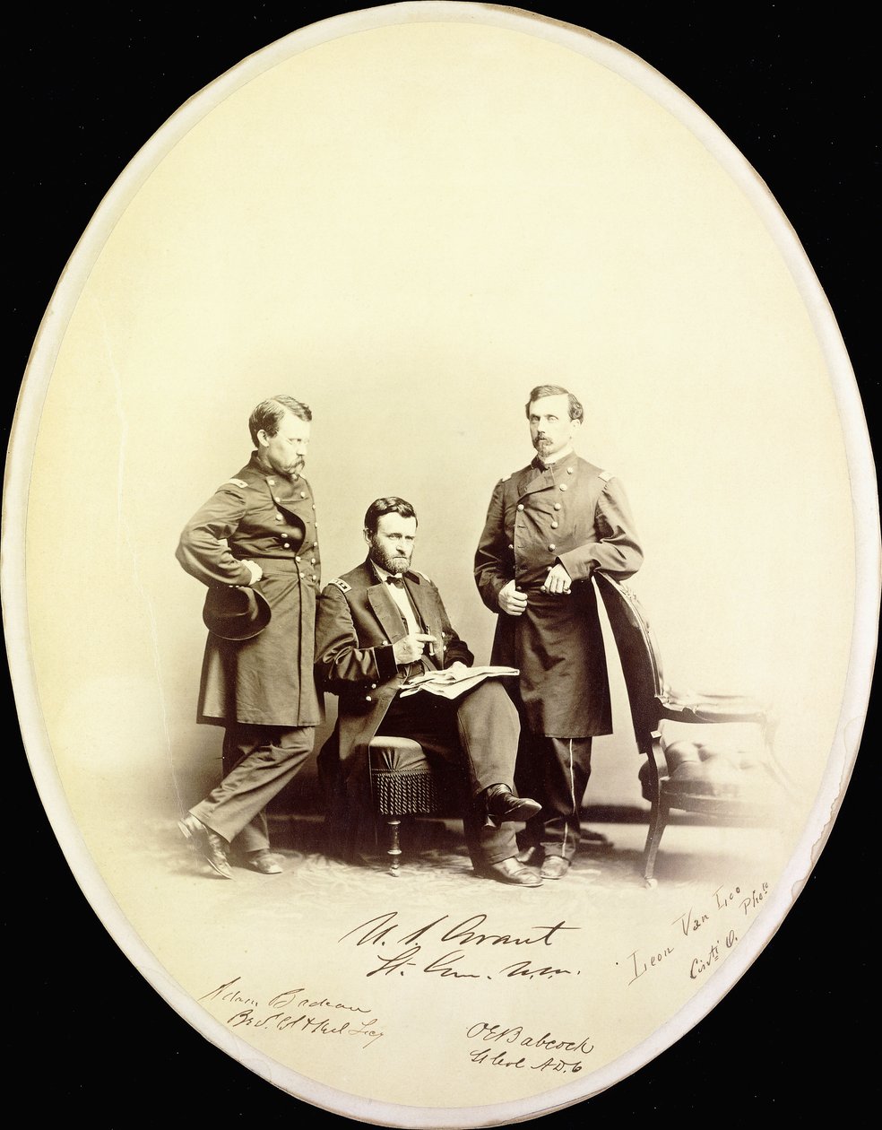 Signed photograph of Ulysses S. Grant and his aides, Orville E. Babcock and Adam Badeau, in military uniform, c.1865 by American Photographer