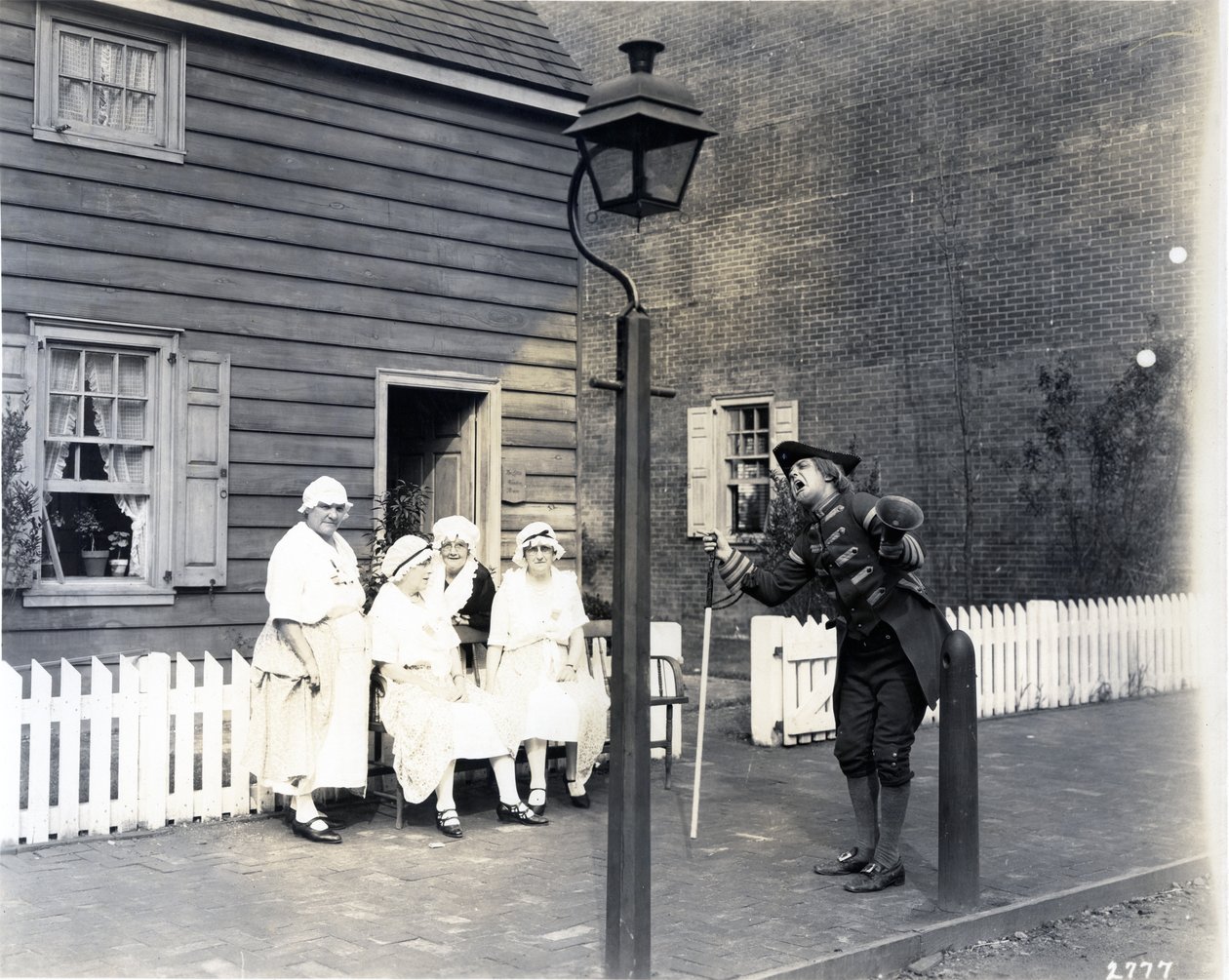 Town Crier on the High Street, 1926 by American Photographer