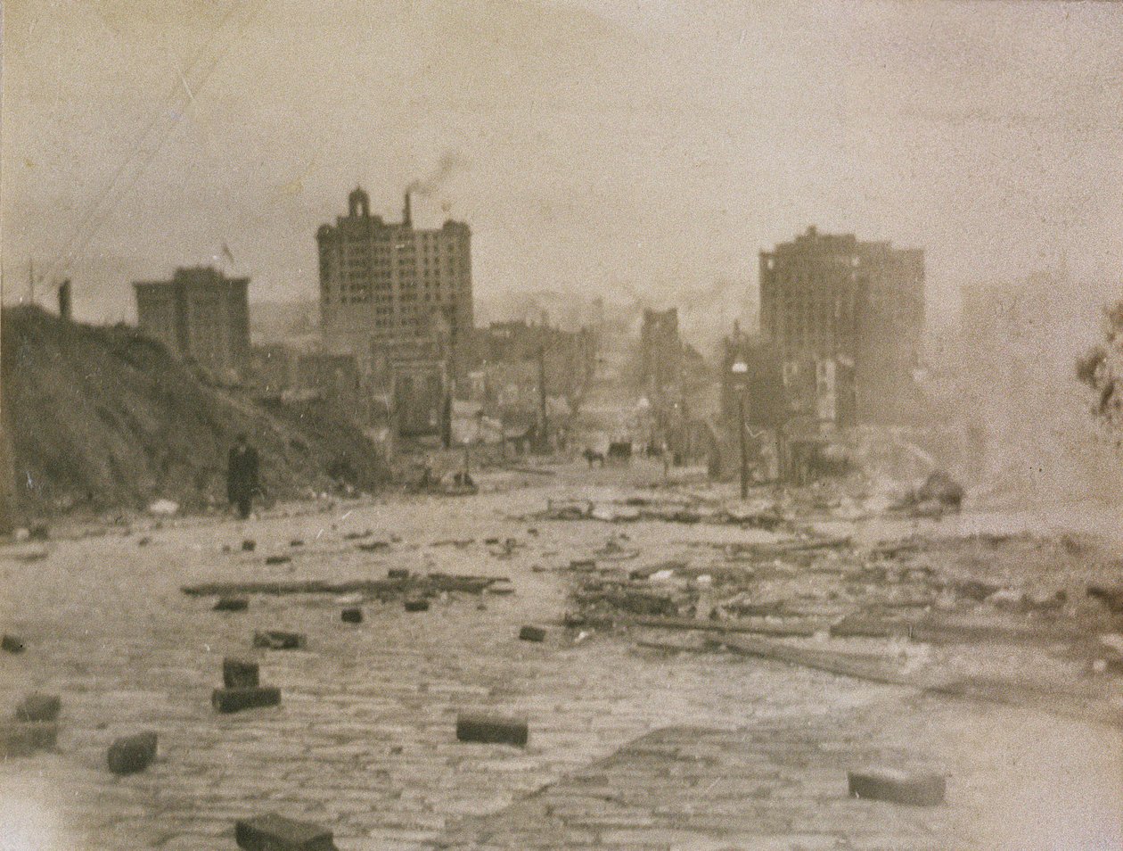 View of the San Francisco skyline with smoke from the fire caused by the earthquake, 1906 by American Photographer