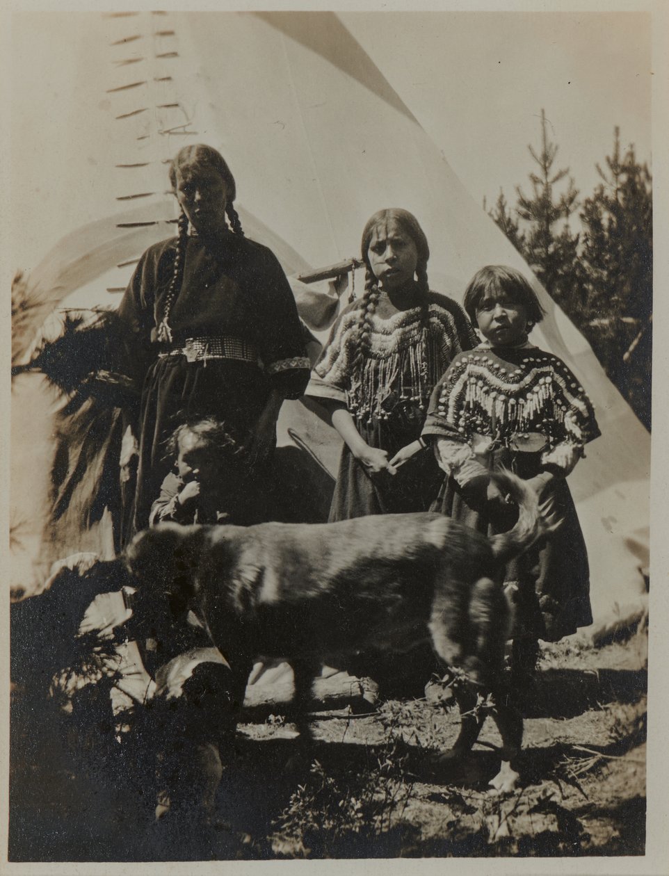 Woman, Two Girls and a Child with Dog, ca. 1900 by American Photographer