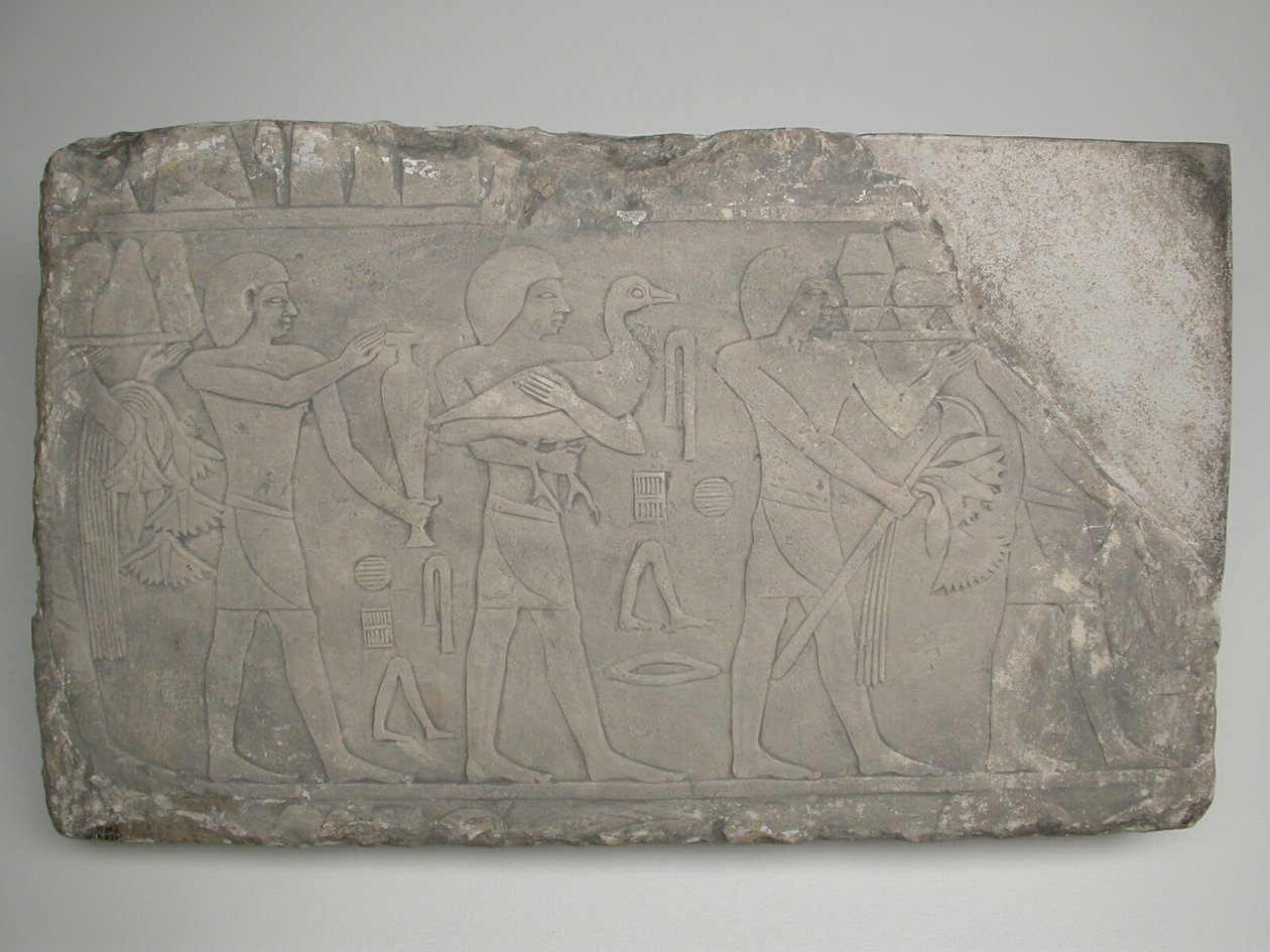 Wall Fragment from a Tomb Depicting Offering Bearers by Ancient Egyptian