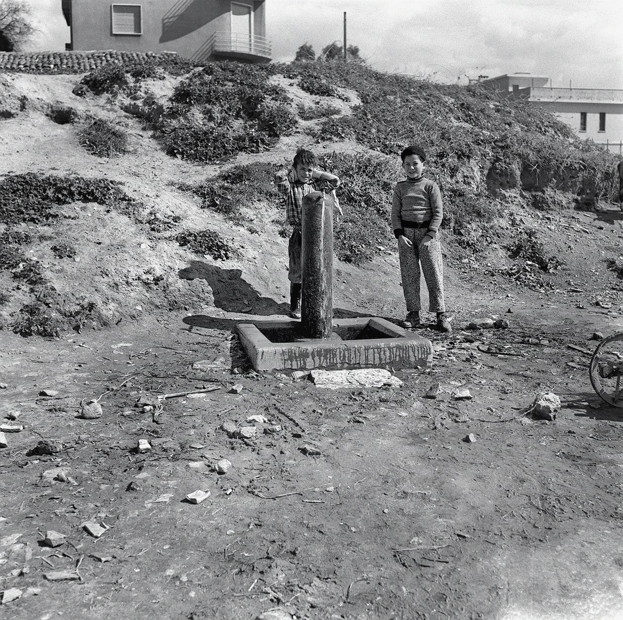 Children at the Village Fountain by Ando Gilardi