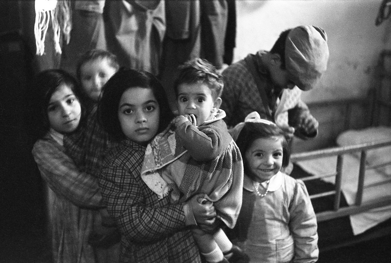 Crotone - Group of Children Indoors by Ando Gilardi