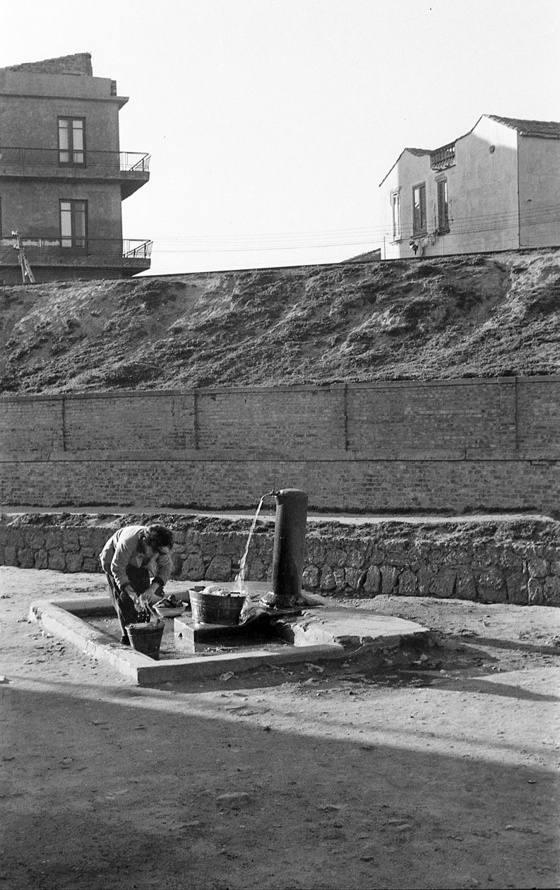 Woman at the Fountain, Crotone by Ando Gilardi