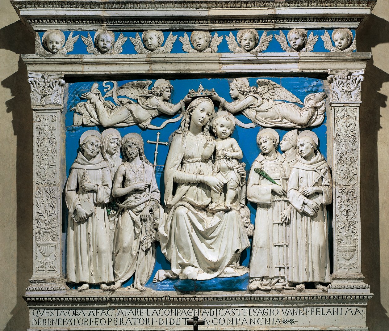 Madonna and Child with Saints, by Andrea della Robbia (1435-1525), glazed earthenware, Medici Chapel, Church of Santa Croce, Florence, Italy by Andrea Della Robbia