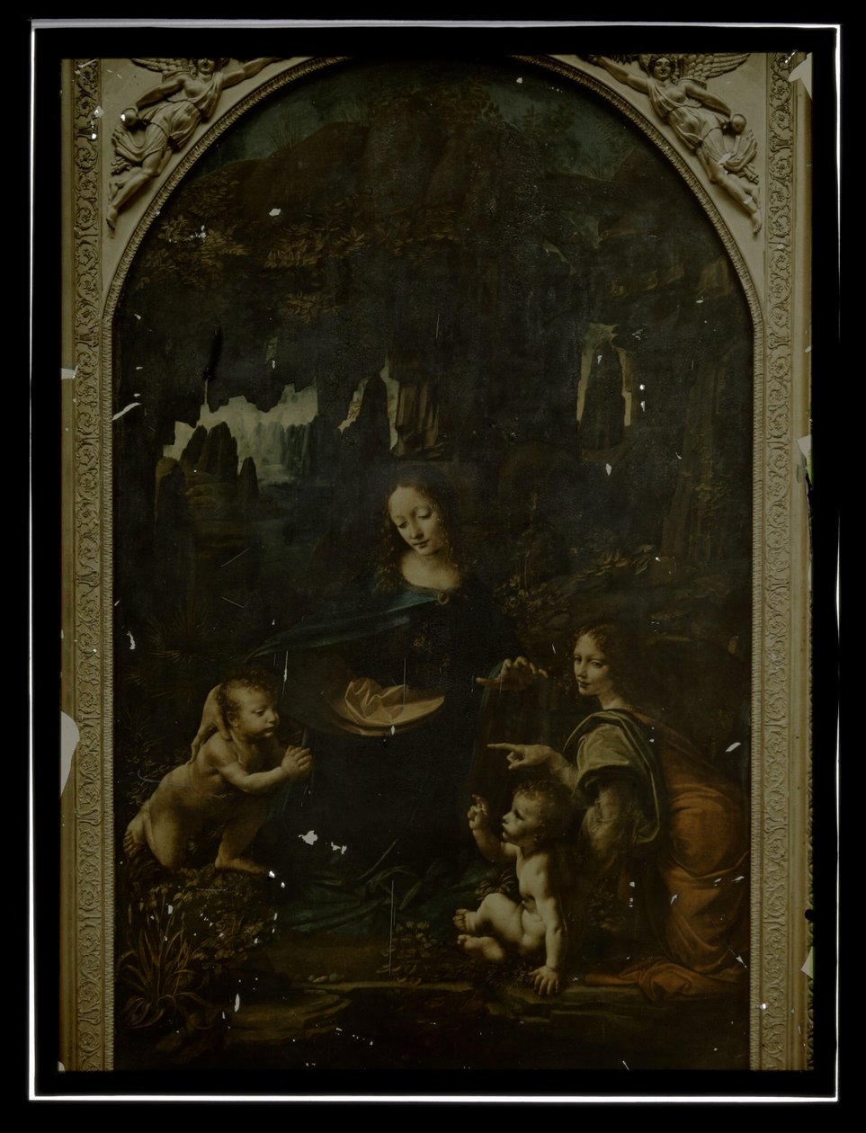 Reproduction of Leonardo da Vinci, Virgin of the Rocks, Louvre by Anonymous