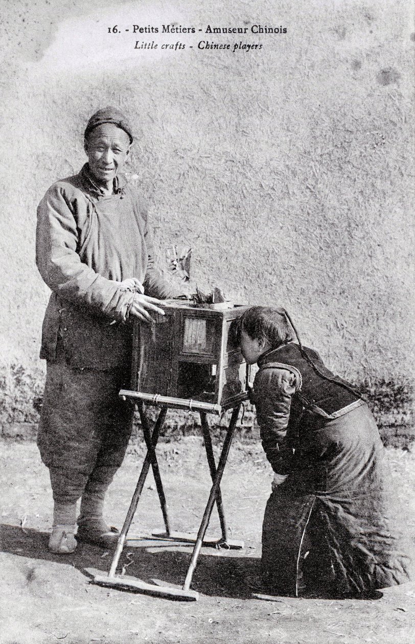 A Traveling Entertainer with an Image Box - Photograph of the Beginning of the 20th Century - Private Collection by Anonymous Anonymous