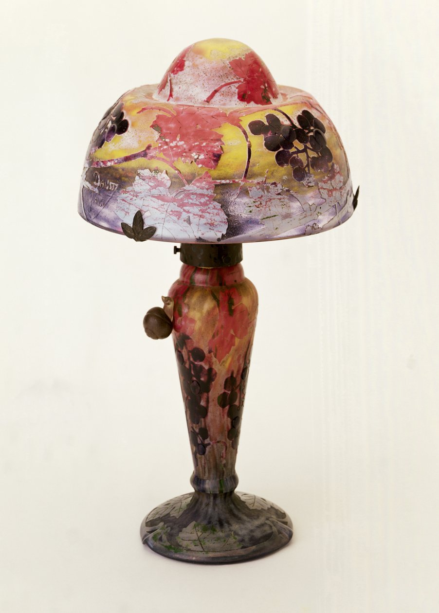 Carved and etched table lamp by Auguste Daum