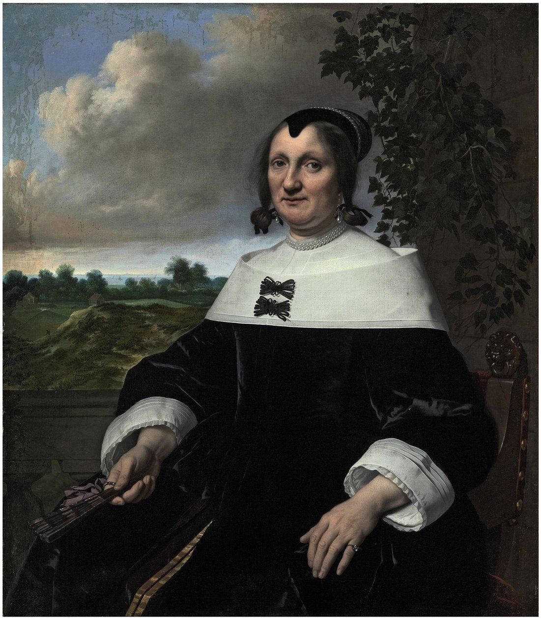Portrait of a Lady, Probably Hester du Pire, Seated Before a Balustrade, Holding a Fan, with a View Out to the Sea Beyond by Bartholomeus van der Helst