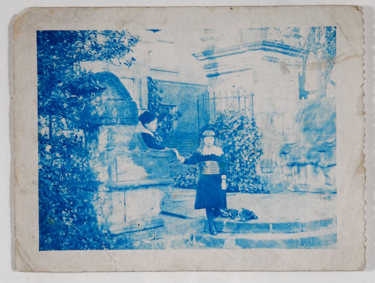 Elaine and Lancelot Grimshaw at the Gates of Knostrop Hall by British Photographer