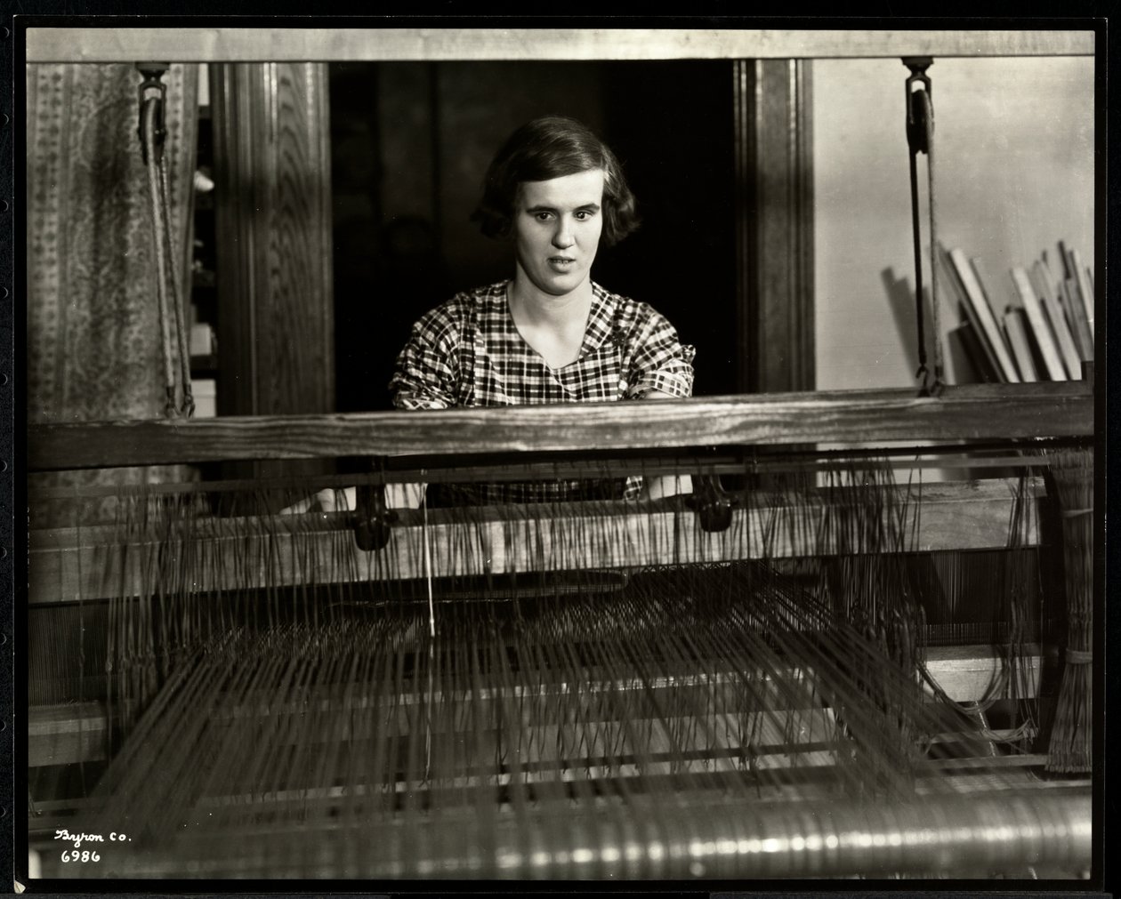 Blind Young Woman Working at a Loom at the New York Association for the Blind, 111 East 59th Street, New York, 1934 by Byron Company