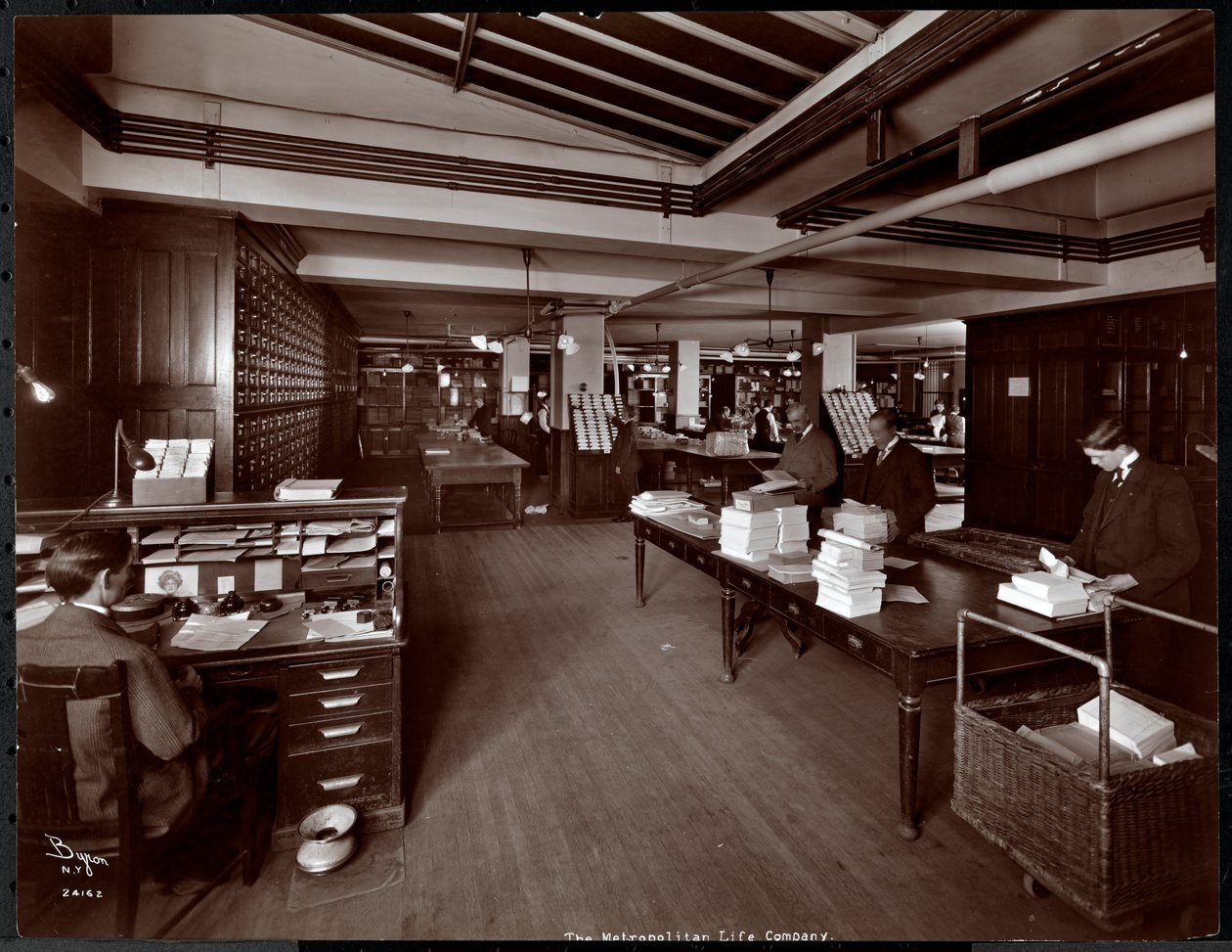 Men working in a sorting room at the Metropolitan Life Insurance Co. at 23rd Street and Madison Avenue, New York, 1907 by Byron Company