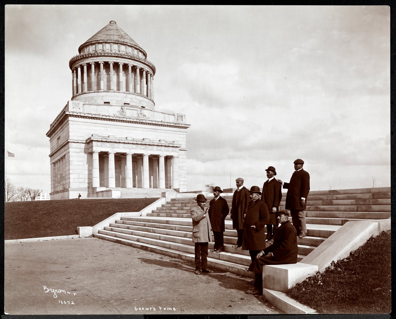 Seven African American men walking away from Grant
