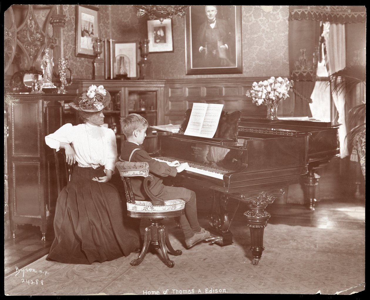 Theodore Edison and his music teacher at the piano, 1907 by Byron Company