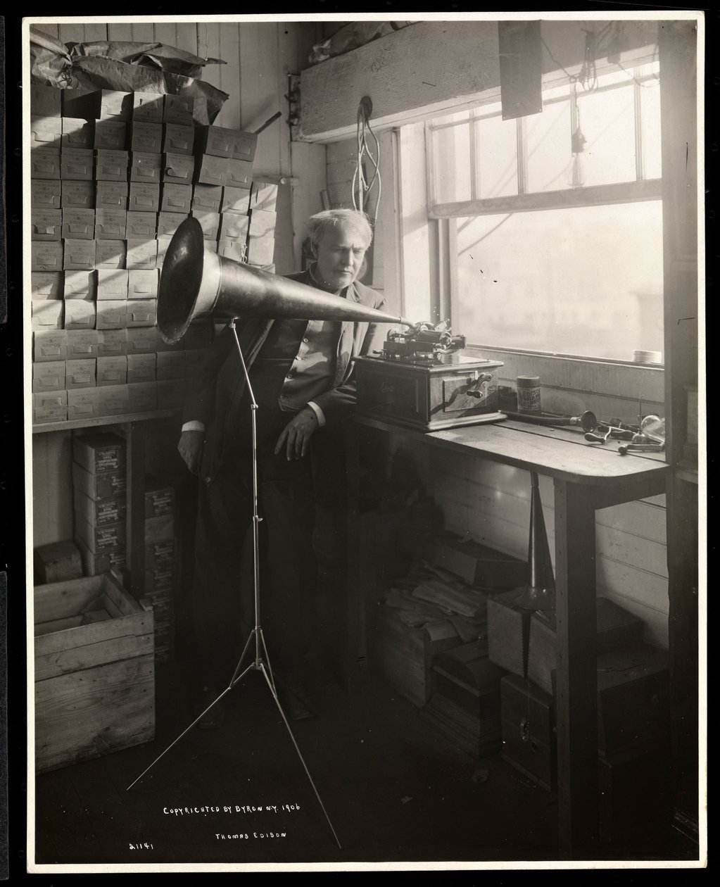 Thomas Edison Standing Next to a Phonograph in His Laboratory by Byron Company