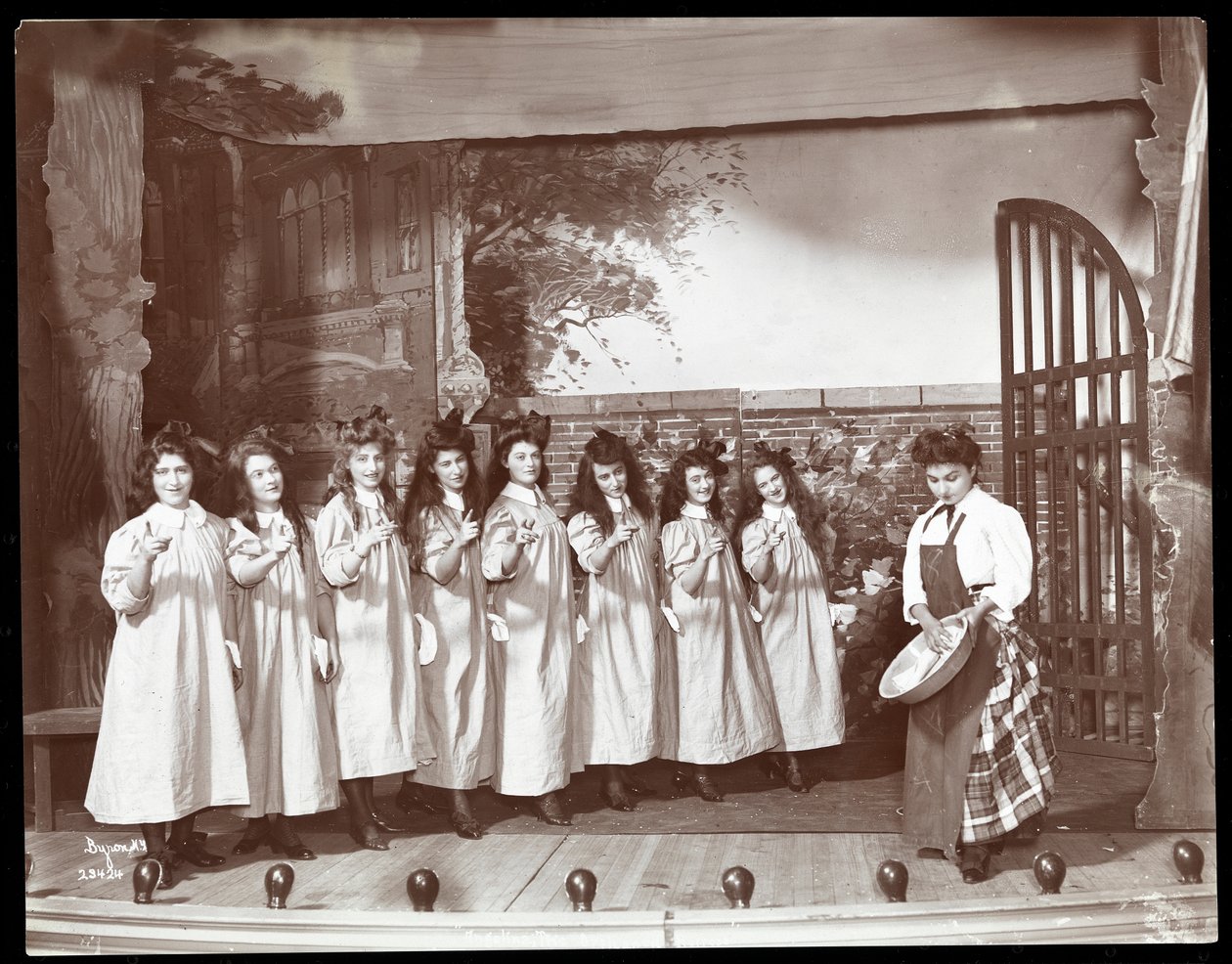 A scene from an amateur production of a play titled Angelina, The Orphaned Heiress presented at Barnard College, New York by Byron Company