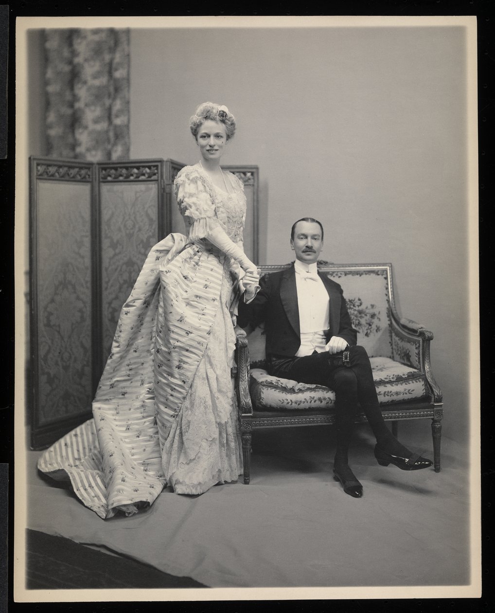 Portrait of an unidentified man and woman at the James Hazen Hyde Ball, New York, January 31, 1905 by Byron Company