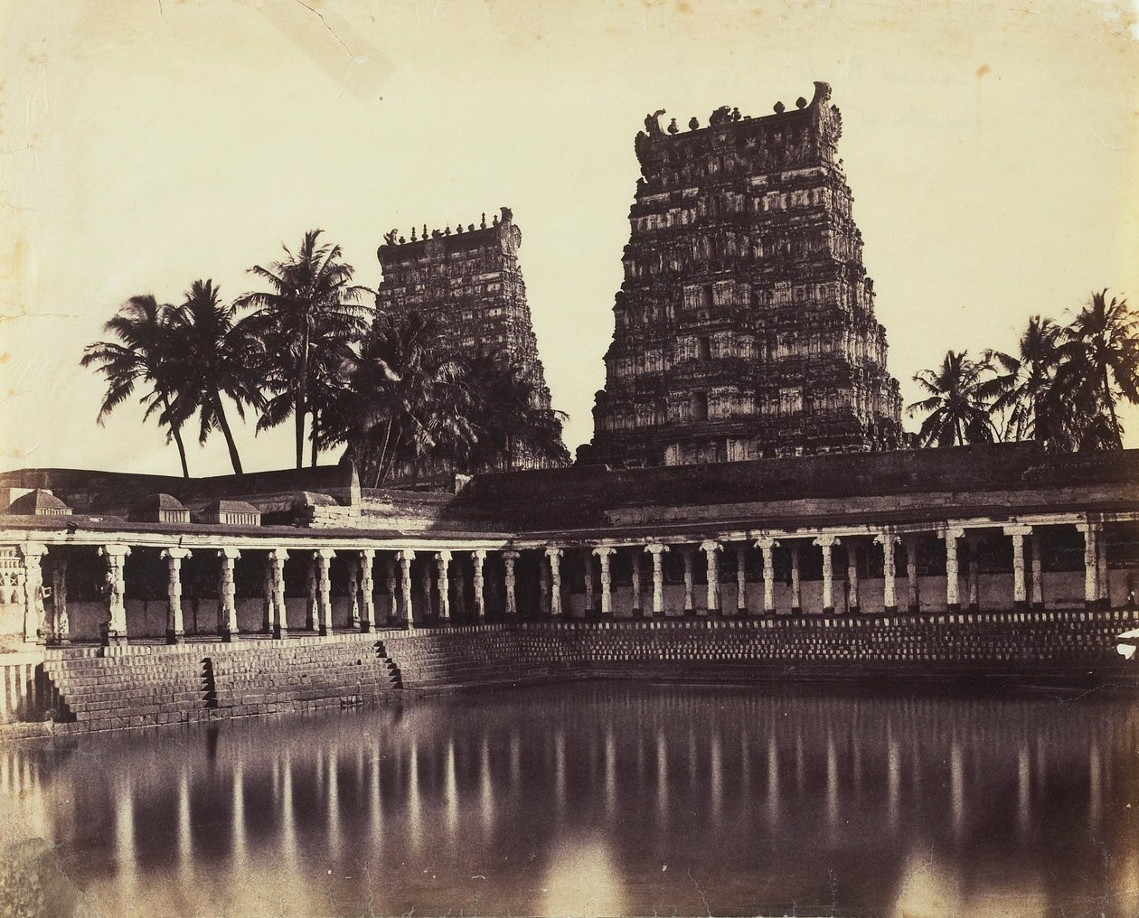Madura. The Great Pagoda, Mootoo Alaghur and East Gopurum from Tank by Linnaeus Tripe