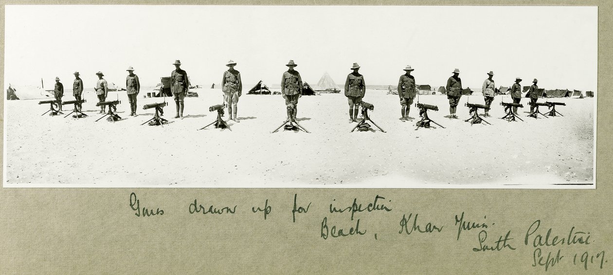 Guns drawn up for inspection on the beach, Khan Yunis, September 1917 by Capt. Arthur Rhodes