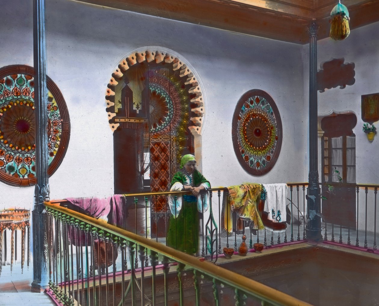 Moroccan woman in gallery, image date: circa 1910, Carl Simon Archive by Carl Simon