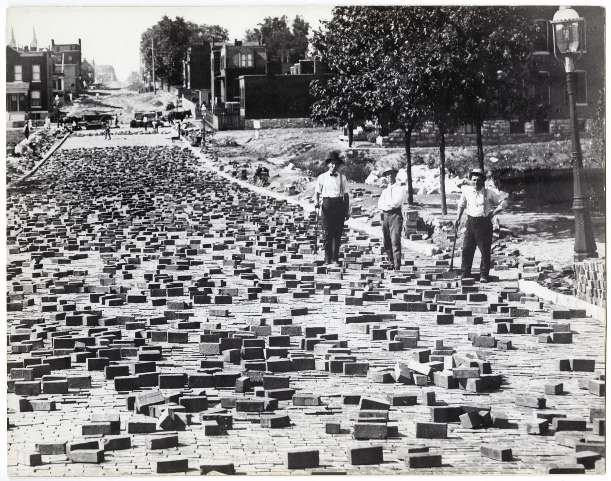 Three Men Working to Pave a Street with Bricks, Compton near Meramec by Charles Clement Holt